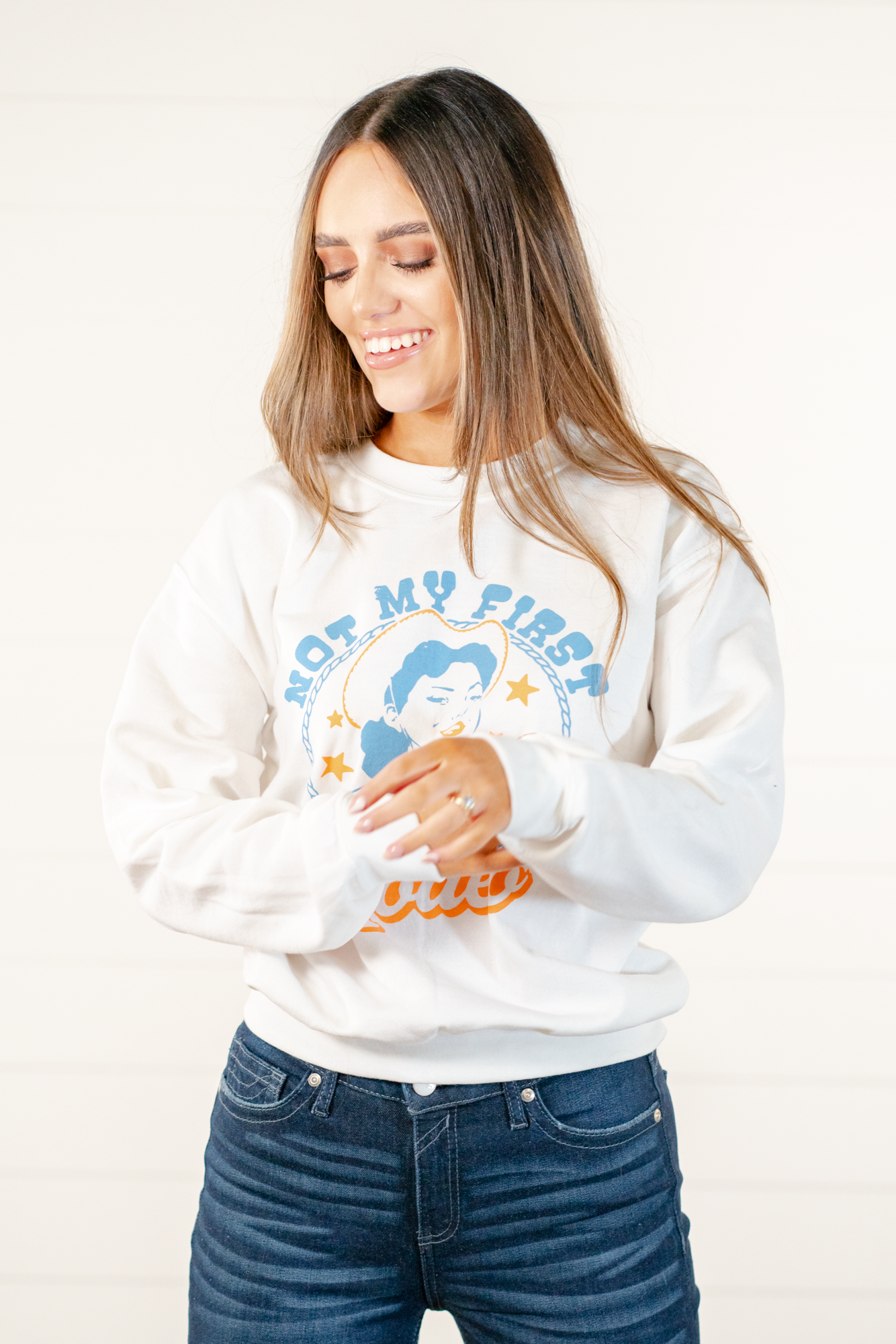 Not My First Rodeo!  Color: White Neckline: Round Sleeve: Long Sleeve Oversized Pull Over Style #: 5351-SS Contact us for any additional measurements or sizing.     