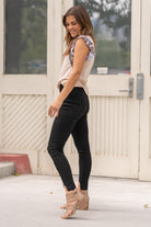 KanCan Jeans  Color: Black Cut: Ankle Skinny, 27.5" Inseam Rise: High-Rise, 9.5" Front Rise Material: COTTON 38% LY 31.2% POLYESTER 29% SPANDEX 1.2% Detail: Step-Hem and Distressed Ripped Legs Fly: Zipper Fly Style #: KC7283BK Contact us for any additional measurements or sizing.