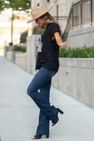 Zutter  This top spoke to you, now tell everyone else. You are a cowgirl at heart.  Collection: Fall 2020 Color: Black Neckline: Round Sleeve: Short Material: 50% Modal 50% Cotton Style #: F425-0139 Contact us for any additional measurements or sizing.  Taylor is 5'7" and wears a size 3 in jeans, small top and an 8.5 in shoes. She is wearing a size small in this tee.