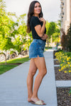High Rise Boyfriend Shorts By Kan Can  Collection: Summer 2020 Boyfriend Shorts High Rise waist, 11" Front Rise Shorts, 3" Inseam Dark Wash Material: 100% COTTON  Stitching: Classic Fly: Exposed Button Fly Style #: KC7823D