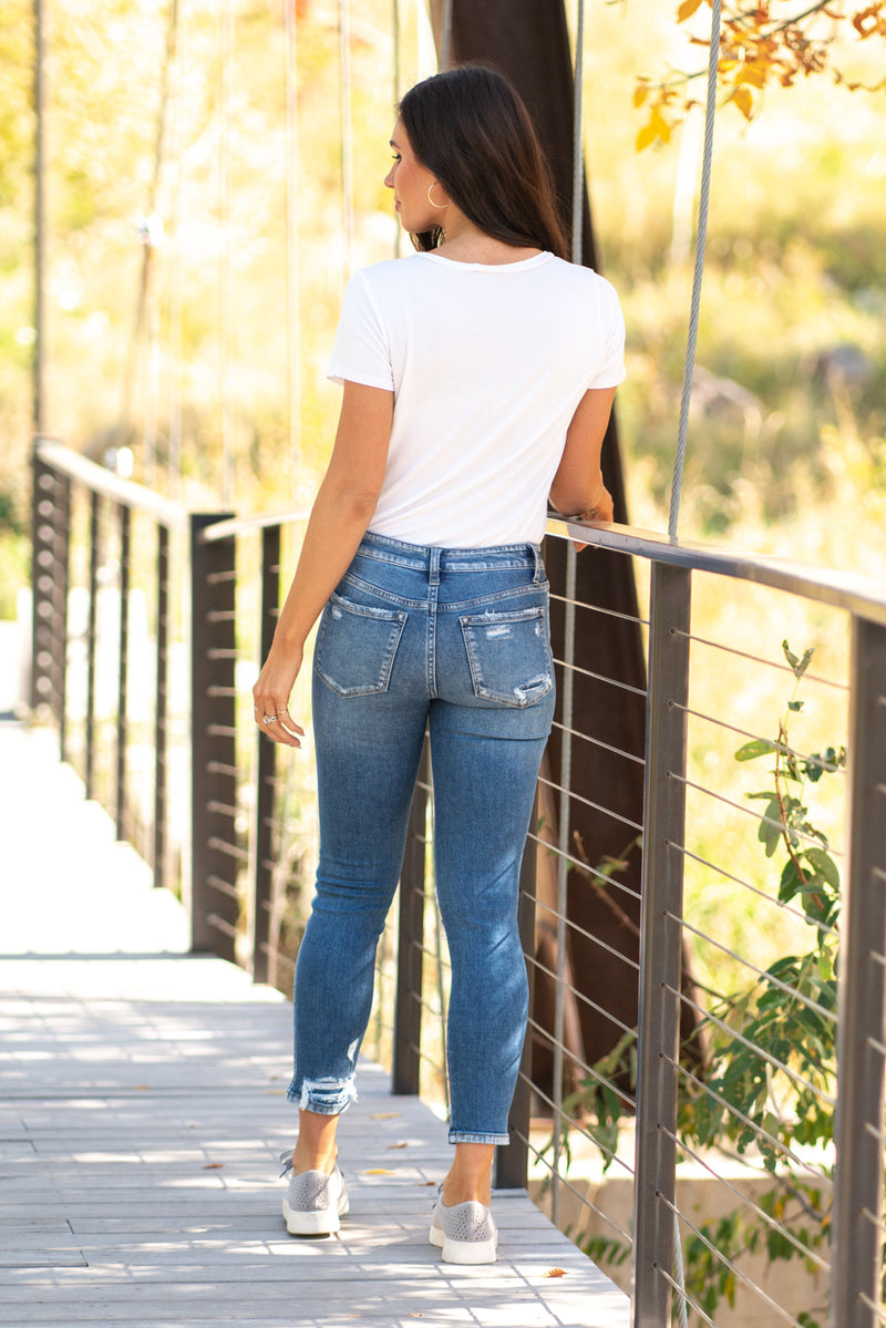 VERVET by Flying Monkey Jeans Collection: Fall 2020 Name: Blue Feels Skinny, 27" Inseam Rise: Mid Rise, 9.25" Front Rise 92.5% COTTON 5.5% POLYESTER 2% SPANDEX Machine Wash Separately In Cold Water Stitching: Classic Fly: Zipper Style #: VT1167 Contact us for any additional measurements or sizing.  Chloe is 5’8" and 130 pounds. She wears a size 26 in jeans, a small top and 8.5 in shoes. She is wearing a 26/3 in these jeans.