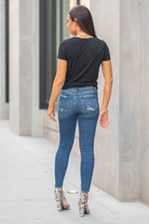Hidden Jeans Collection: Fall 2020 Color: Medium Blue Cut: Skinny, 28" Inseam  Rise: High-Rise, 10.5" Front Rise 98% Cotton, 2% Spandex Machine Wash Separately In Cold Water Stitching: Classic Fly: Zipper Fly Style #: HD1187H Contact us for any additional measurements or sizing.  Chloe is 5’8" and 130 pounds. She wears a size 3 in jeans, a small top and 8.5 in shoes. She is wearing a 26/3 in these jeans.
