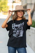 Zutter  This top spoke to you, now tell everyone else. You are a cowgirl at heart.  Collection: Fall 2020 Color: Black Neckline: Round Sleeve: Short Material: 50% Modal 50% Cotton Style #: F425-0139 Contact us for any additional measurements or sizing.  Taylor is 5'7" and wears a size 3 in jeans, small top and an 8.5 in shoes. She is wearing a size small in this tee.