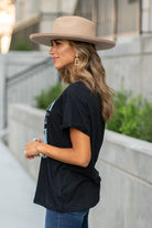 Zutter  This top spoke to you, now tell everyone else. You are a cowgirl at heart.  Collection: Fall 2020 Color: Black Neckline: Round Sleeve: Short Material: 50% Modal 50% Cotton Style #: F425-0139 Contact us for any additional measurements or sizing.  Taylor is 5'7" and wears a size 3 in jeans, small top and an 8.5 in shoes. She is wearing a size small in this tee.