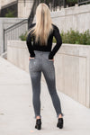 KanCan Jeans Collection: Winter 2020 Color: Dark Grey Cut: Skinny, 27" Inseam Rise: High-Rise, 9" Front Rise COTTON 94.2% POLYESTER 4.7% SPANDEX 1.1% Stitching: Classic Fly: Zipper Style #: KC7148BK Contact us for any additional measurements or sizing.  Melissa is 5'5" and wears a 24 in jeans, small top and size 6 shoe. She is wearing a 24 in these jeans.