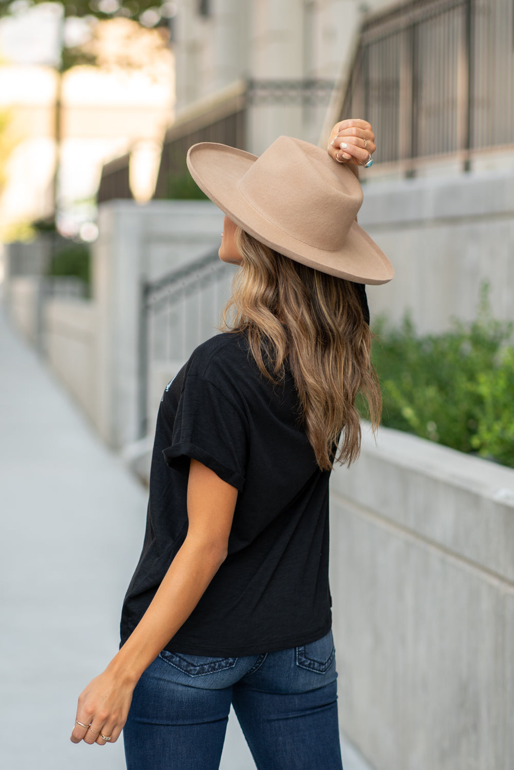 Zutter  This top spoke to you, now tell everyone else. You are a cowgirl at heart.  Collection: Fall 2020 Color: Black Neckline: Round Sleeve: Short Material: 50% Modal 50% Cotton Style #: F425-0139 Contact us for any additional measurements or sizing.  Taylor is 5'7" and wears a size 3 in jeans, small top and an 8.5 in shoes. She is wearing a size small in this tee.