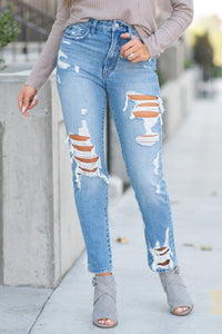 Flying Monkey Jeans Collection: Fall 2020 Name: Goodbye Cut: Mom Fit, 28" Straight Rise: High Rise, 11" Front Rise 100% Cotton Machine Wash Separately In Cold Water Stitching: Classic Fly: Zipper Style #: Y3971 Contact us for any additional measurements or sizing.  Taylor is 5'7" and wears a size 3 in jeans, small top and an 8.5 in shoes. She is wearing a size 25/3 in these jeans.