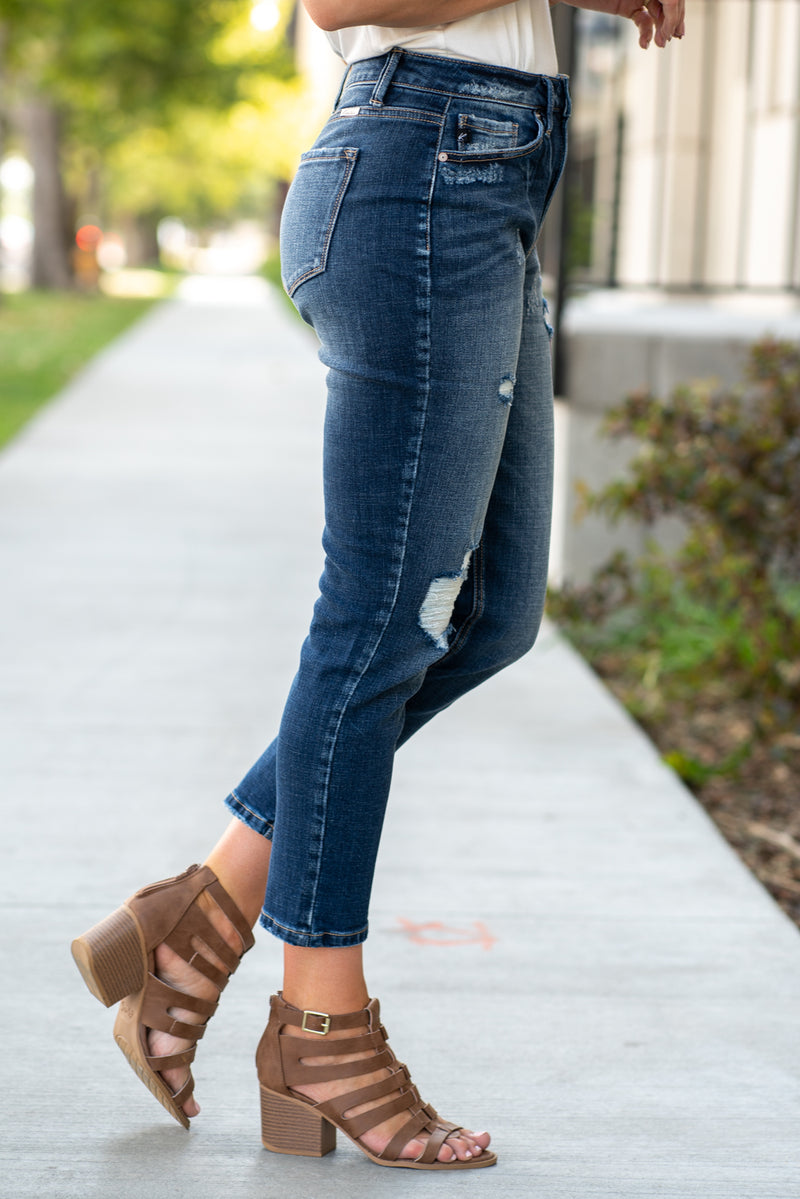 KanCan Jeans Collection: Fall 2020 Color: Dark Wash  Ankle Skinny, 27" Inseam  High Rise, 10" Front Rise Distressed Relaxed Mom Fit COTTON 99% SPANDEX 1% Fly: Zipper Style #: KC7133D Contact us for any additional measurements or sizing.  Chloe is 5’8" and 130 pounds. She wears a size 3 in jeans, a small top and 8.5 in shoes. She is wearing a 26/3 in these jeans.