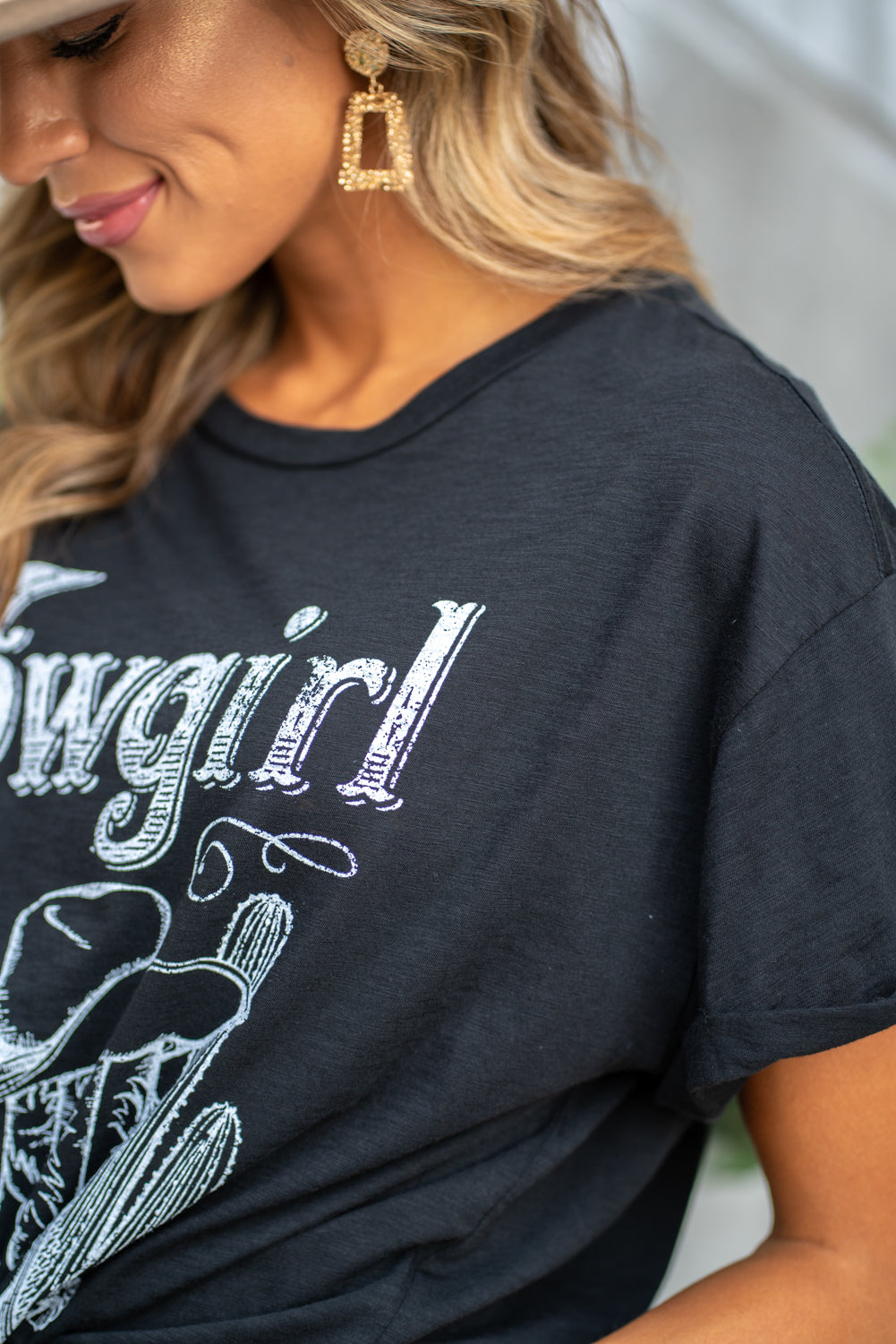 Zutter  This top spoke to you, now tell everyone else. You are a cowgirl at heart.  Collection: Fall 2020 Color: Black Neckline: Round Sleeve: Short Material: 50% Modal 50% Cotton Style #: F425-0139 Contact us for any additional measurements or sizing.  Taylor is 5'7" and wears a size 3 in jeans, small top and an 8.5 in shoes. She is wearing a size small in this tee.