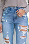 Flying Monkey Jeans Collection: Fall 2020 Name: Goodbye Cut: Mom Fit, 28" Straight Rise: High Rise, 11" Front Rise 100% Cotton Machine Wash Separately In Cold Water Stitching: Classic Fly: Zipper Style #: Y3971 Contact us for any additional measurements or sizing.  Taylor is 5'7" and wears a size 3 in jeans, small top and an 8.5 in shoes. She is wearing a size 25/3 in these jeans.